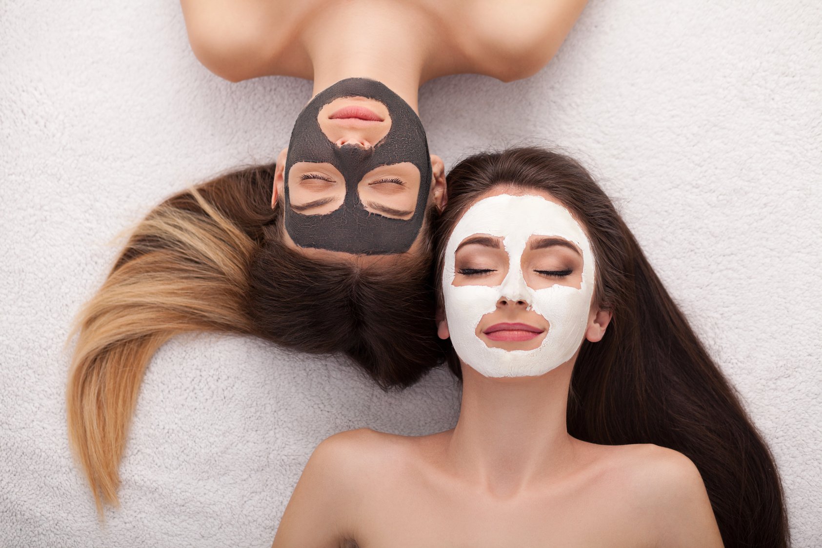 Young Women Getting Facial Treatment at the Spa